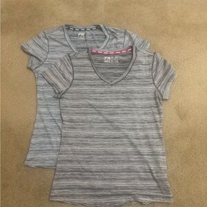 2 New women’s Reebok quick dry Tees